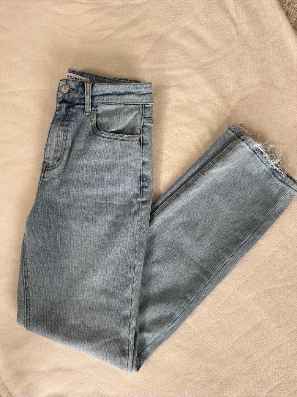 High-Rise Light Blue Women's Jeans with Frayed Hem